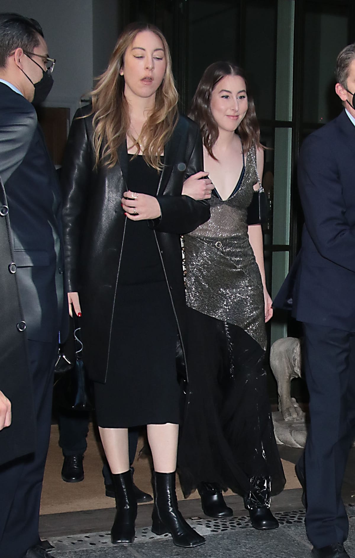 Alana Haim arrives with her sister Este to promote Licorice Pizza during an appearance on Late Night with Seth Meyers