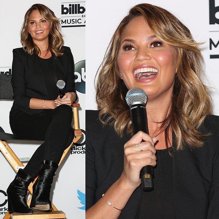 Chrissy Teigen answering questions during the 2015 Billboard Music Awards finalists press conference