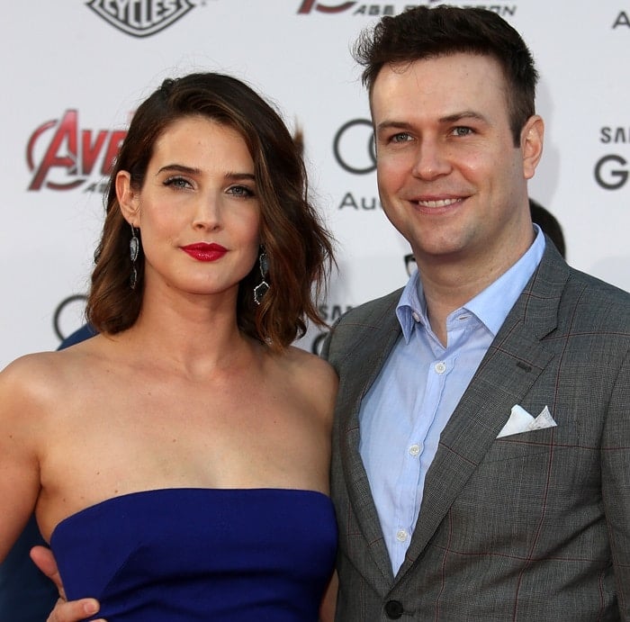 Hollywood's Glamorous Couple: Cobie Smulders with husband Taran Killam at the Avengers: Age of Ultron premiere, showcasing elegance and style