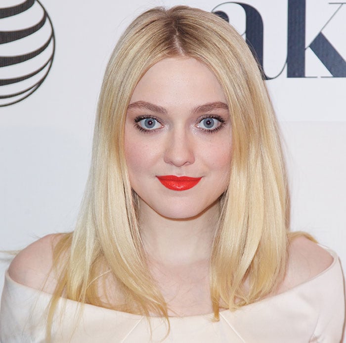 Dakota Fanning's blonde tresses were styled straight and parted in the center