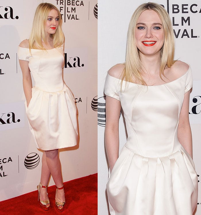 Dakota Fanning with coral red lipstick and dark eyeliner