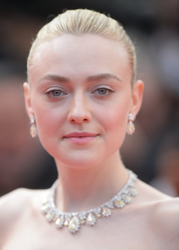 Dakota Fanning accessorized with Chopard jewelry for the Once Upon A Time In Hollywood premiere