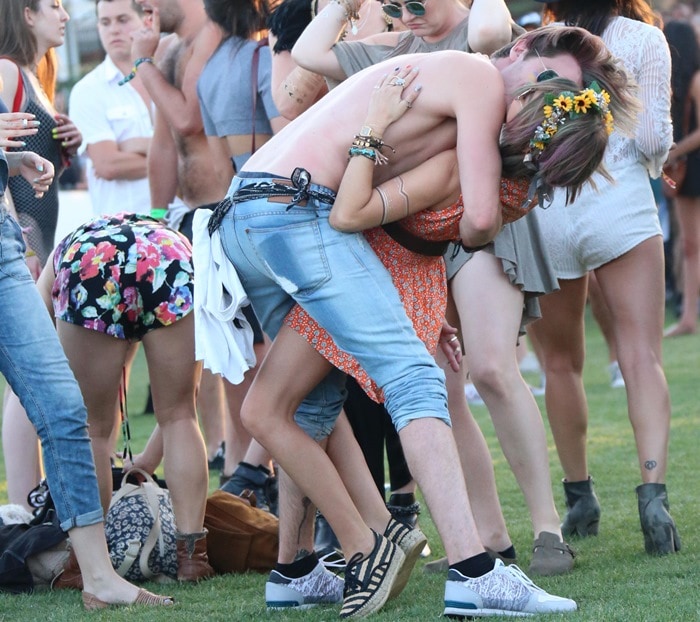 Sarah Hyland and Dominic Sherwood on day two of the 2015 Coachella Music Festival in Indio on April 11, 2015