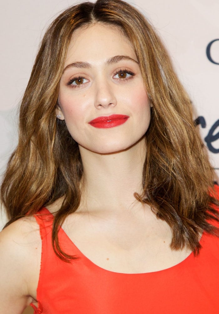 Emmy Rossum's perfect hair, eyeshadow, and lips