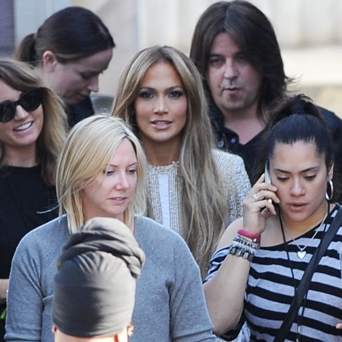 Jennifer Lopez arriving at "American Idol" in Los Angeles wearing a short mini skirt and high heels on April 15, 2015