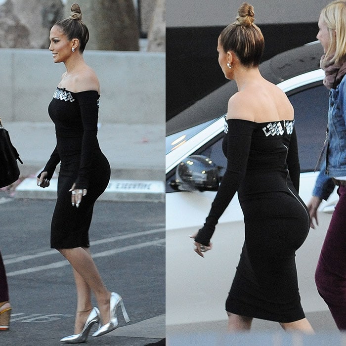 Jennifer Lopez flaunting her curves and famous ass-ets in a figure-hugging, long-sleeve, off-the-shoulder LBD