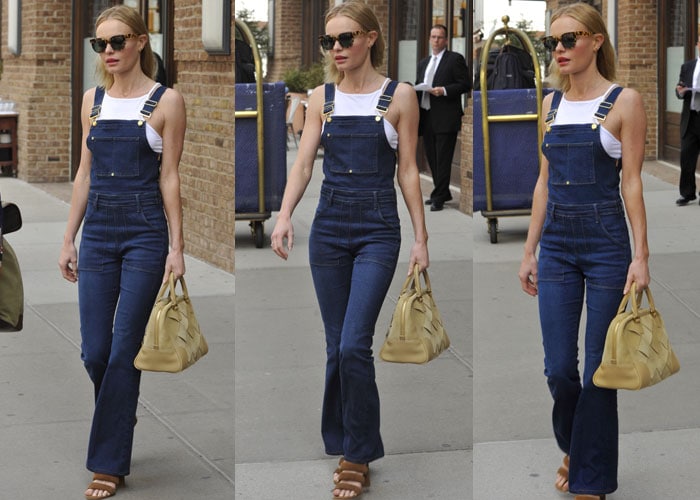 Kate Bosworth carries a yellow tote and wears a pair of flared denim overalls from Frame Denim