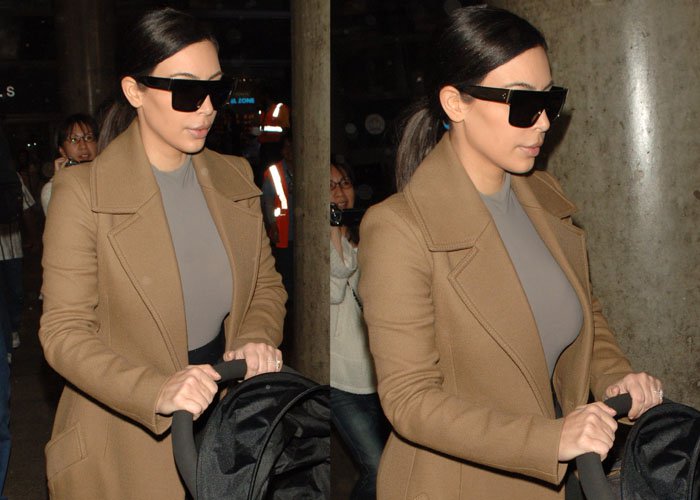 Kim Kardashian in an oversized coat from Céline's Autumn/Winter 2014 collection