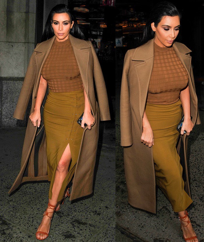 Kim Kardashian wears a Celine coat while leaving a restaurant in New York City