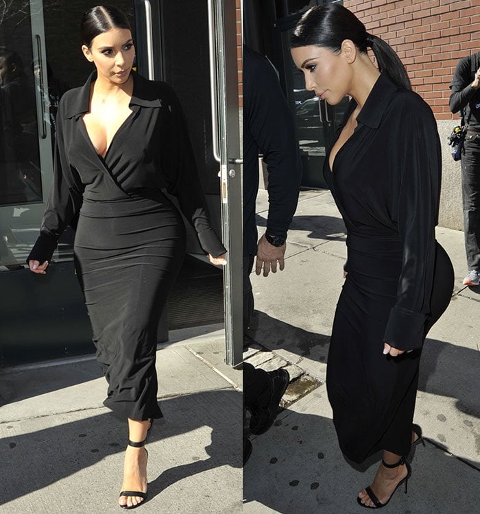 Kim Kardashian with a slick back middle parted low ponytail