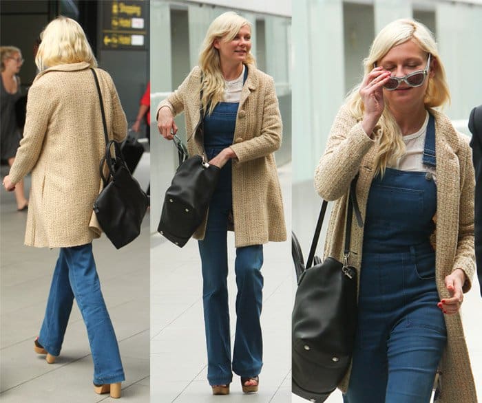 Kirsten Dunst arrives at London airport to catch a flight wearing denim dungarees