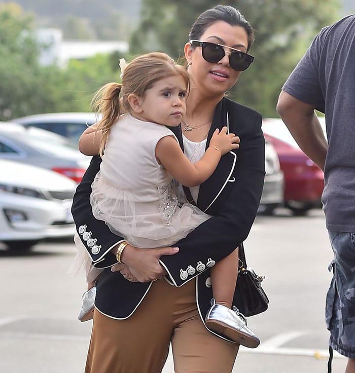 Kourtney Kardashian, Mason Disick, and Penelope Disick on their way to attend the Easter service at West Hills Church in the San Fernando Valley on March 5, 2015