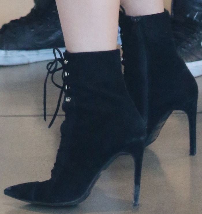 Kylie Jenner's hot legs in Elphaba boots by Jeffrey Campbell