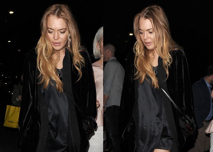 Lindsay Lohan stepped out in a short black dress