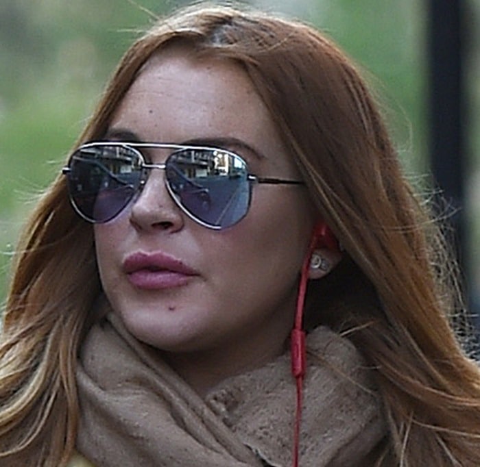 Lindsay Lohan with swollen lips and a bad complexion