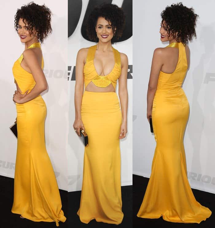 Nathalie Emmanuel wore a striking marigold deep scoop beaded collar dress with a cutout front from the Cushnie et Ochs Spring 2015 collection