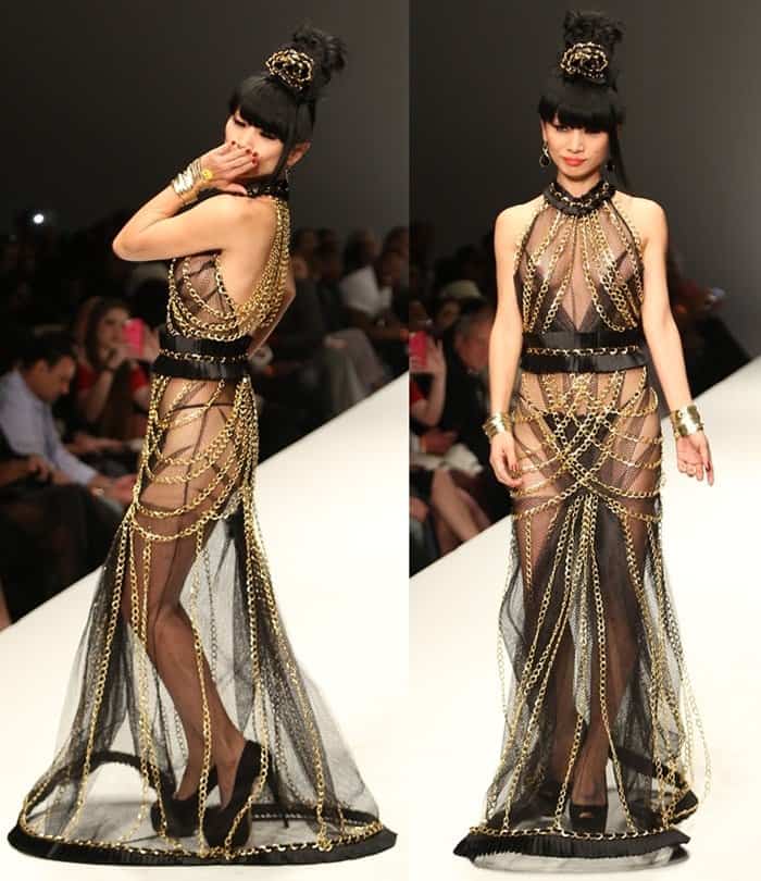Demonstrating her distinctive style once more, Bai Ling made a striking appearance by donning a captivating sheer dress as she graced the runway for the "A Night with Haiti" fashion show held in Los Angeles