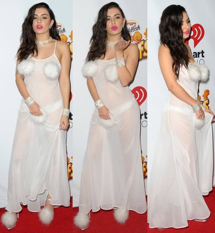Charli XCX opted for a provocative sheer slip dress that leaned more towards lingerie than a traditional red carpet gown