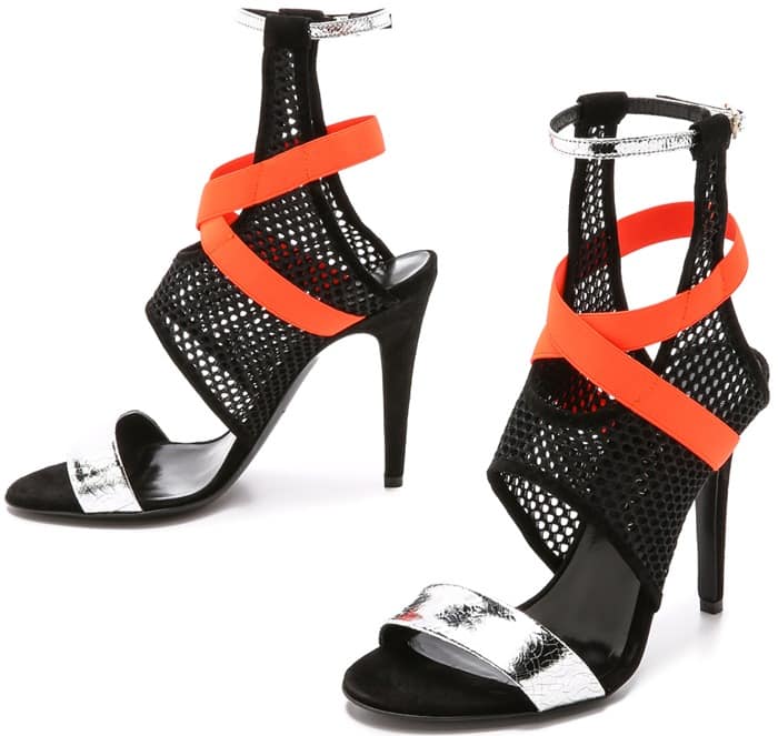 Mesh and elastic lend a sporty feel to avant-garde Tamara Mellon sandals