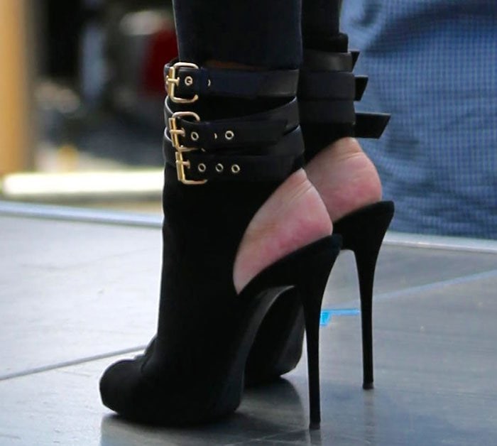 Chrissy Teigen's heels in Giuseppe Zanotti boots