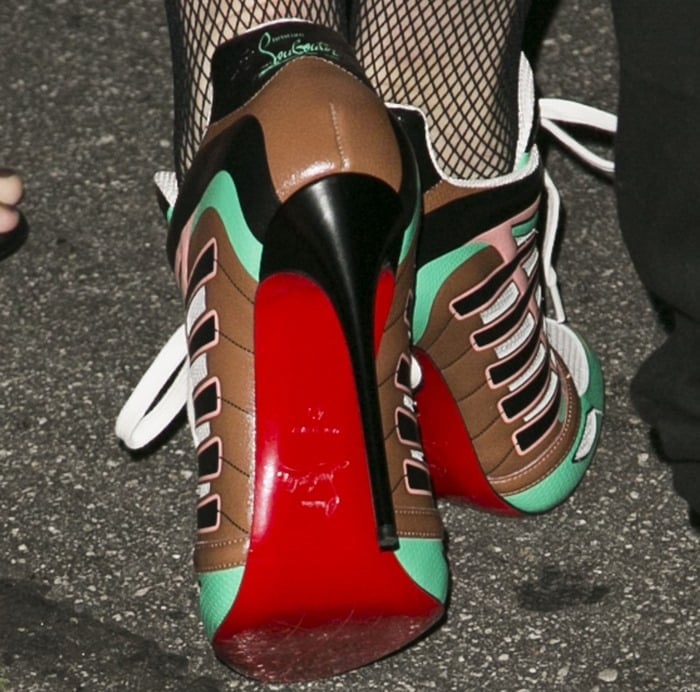 Gwen Stefani's turquoise Boltina trainer red sole pumps