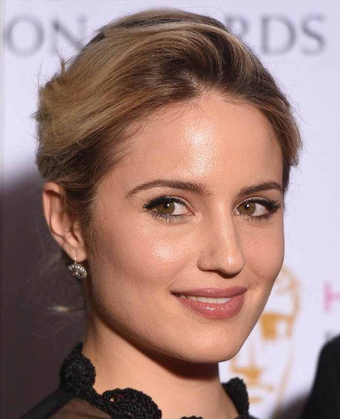 Dianna Agron shows off her sexy lips and earrings