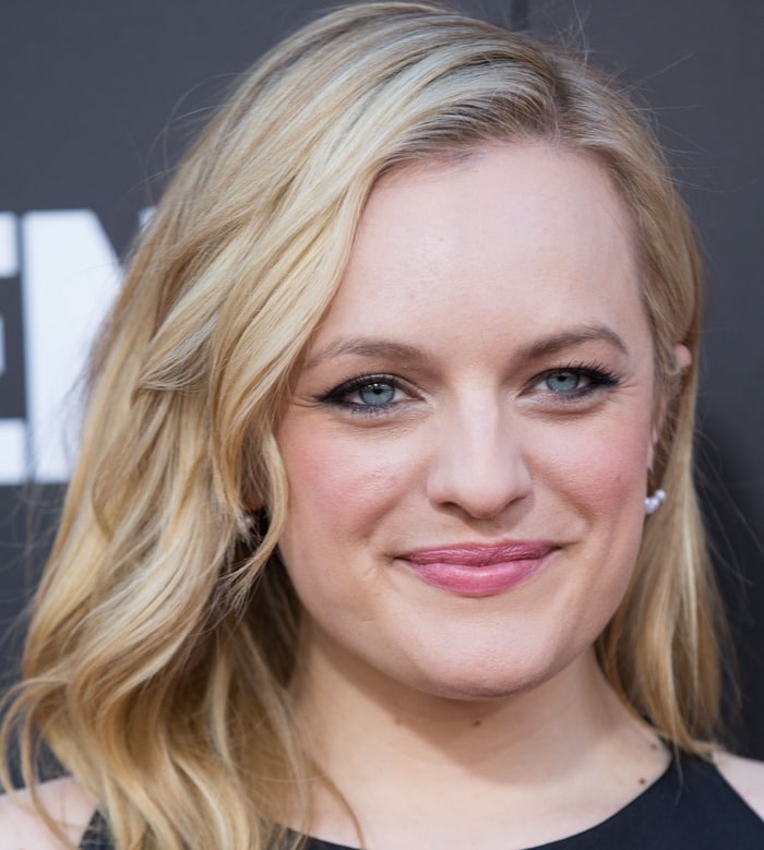 Elisabeth Moss wears her blonde hair down