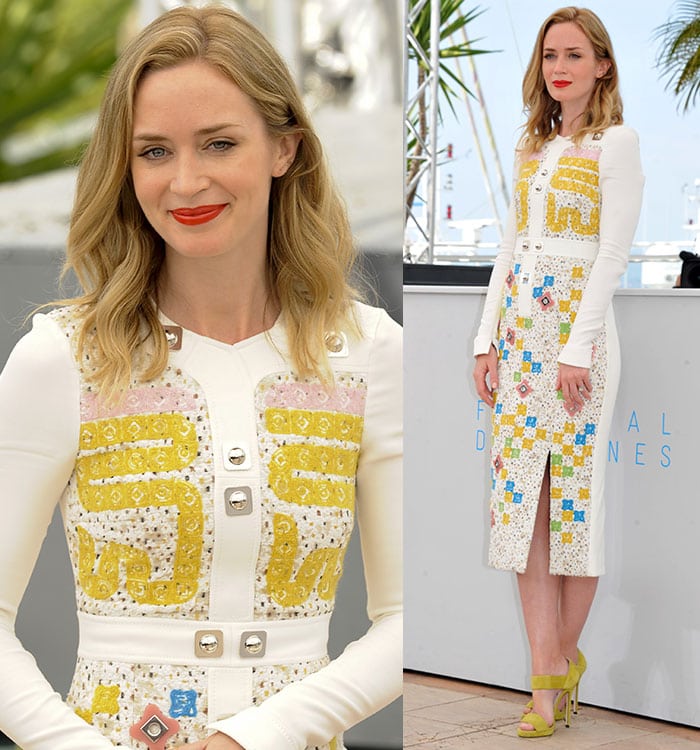 Emily Blunt's dress has a demure silhouette with long sleeves and a mid-length pencil skirt slashed to the thigh for an added daring touch