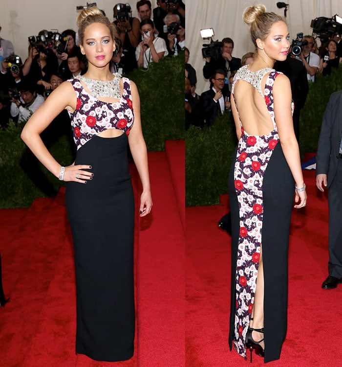 Jennifer Lawrence turned heads in a Christian Dior gown featuring a jeweled neckline, floral-embroidered bodice, and daring cutouts — a modern nod to the evening’s Asian-inspired Met Gala theme