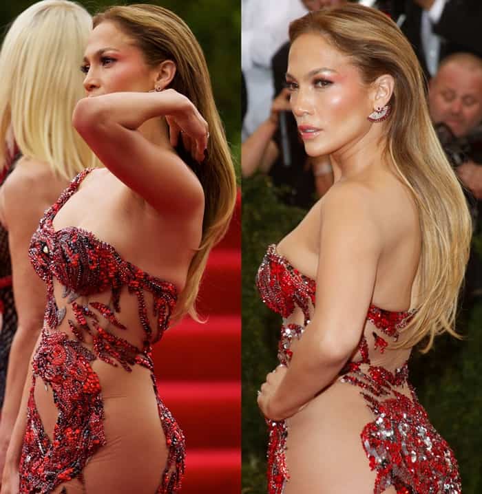 Embracing her signature sultry style, Jennifer Lopez wore an overtly sexy, hyper-embellished Atelier Versace gown