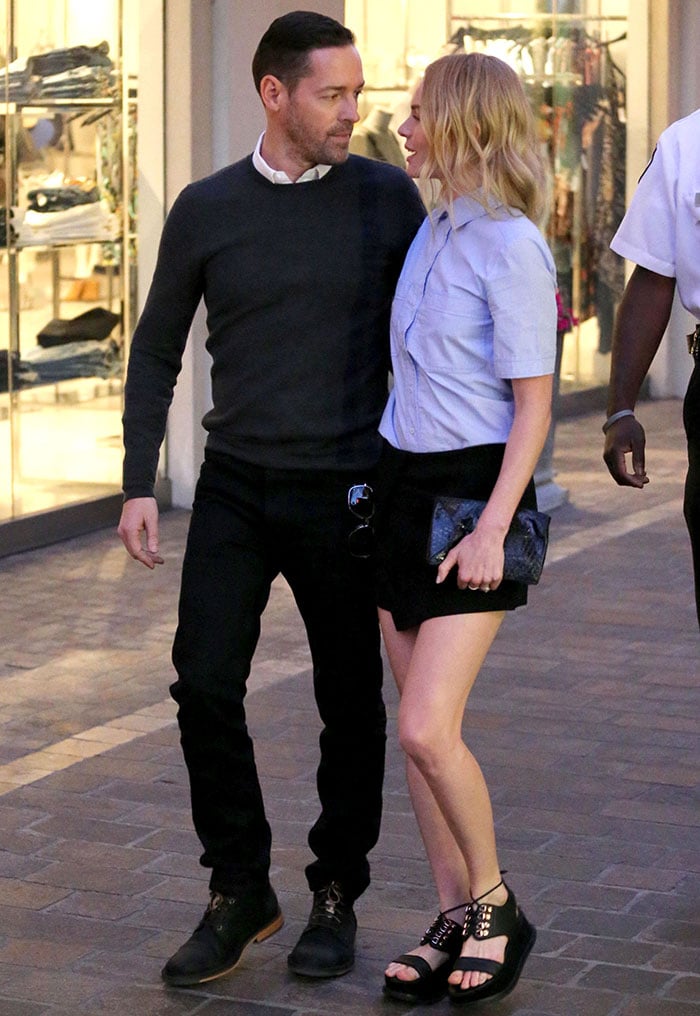 Kate Bosworth flaunted her legs in a blue Vanessa Bruno short-sleeved button-up shirt tucked into a black miniskirt