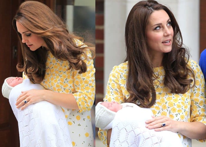 Kate Middleton cradling Princess Charlotte in her arms