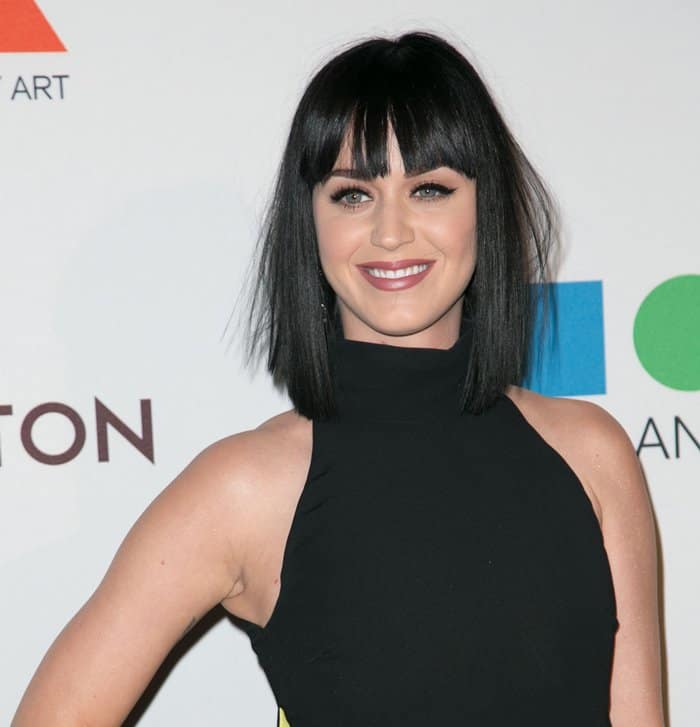 Katy Perry in a high-neck black dress from the Versace Collection at the MOCA Celebrates 35th Anniversary Gala