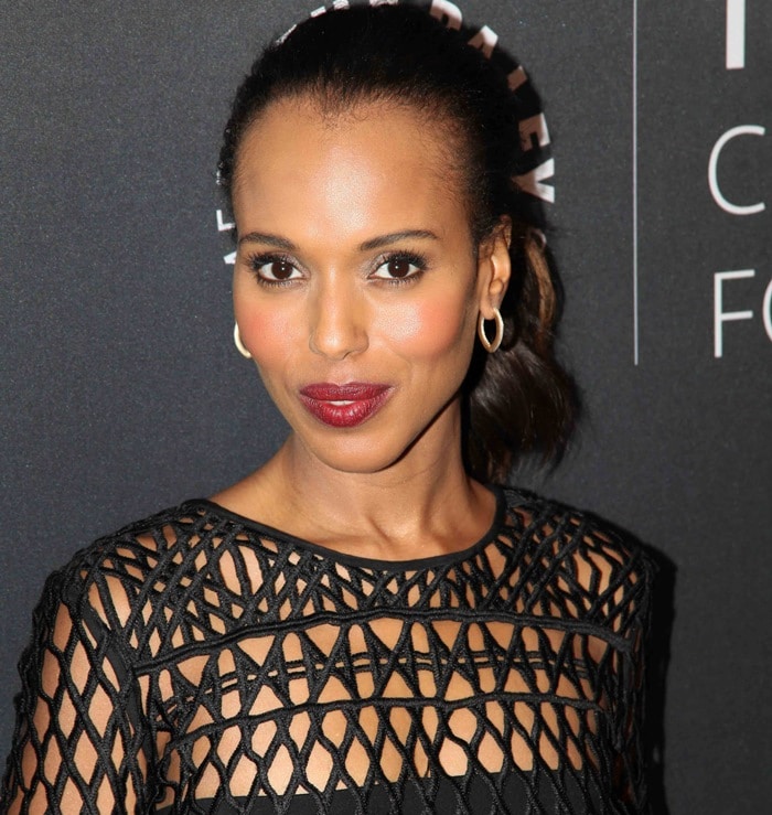 Kerry Washington sported a netted lace Self-Portrait black dress that left her bra and granny panties visible underneath