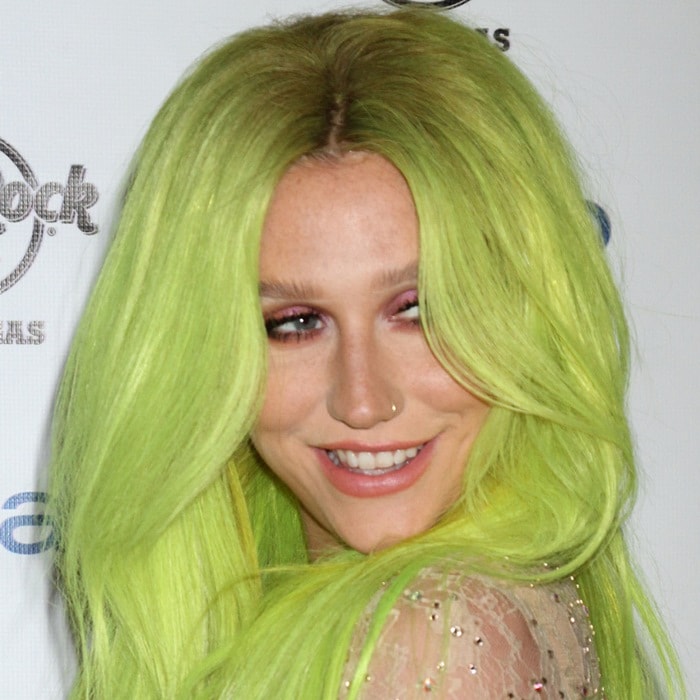 Kesha rocked a new green hairdo while hosting the Memorial Day festivities at Rehab Pool