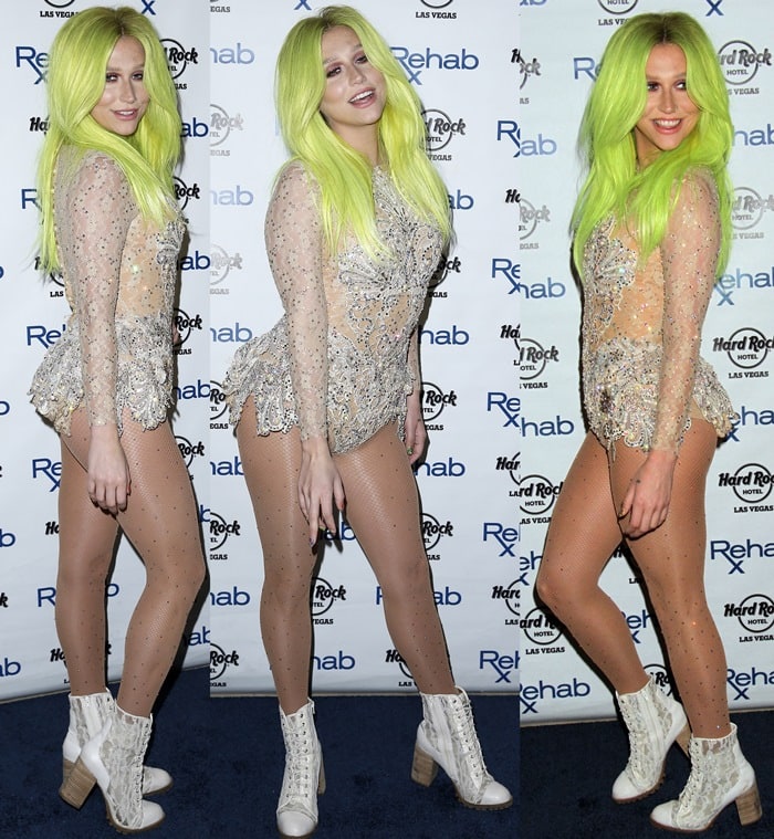 Kesha flashed her legs in a lacy white and silver see-through leotard paired with fishnet stockings