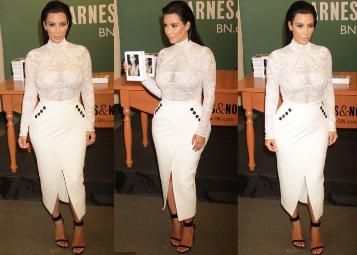Kim Kardashian kept herself looking polished in a Dior top and skirt