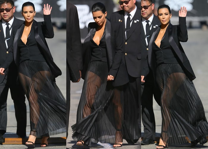 Kim Kardashian turned heads in a daring see-through pleated maxi skirt paired with sleek Gianvito Rossi ankle-strap sandals and a plunging Balmain blazer