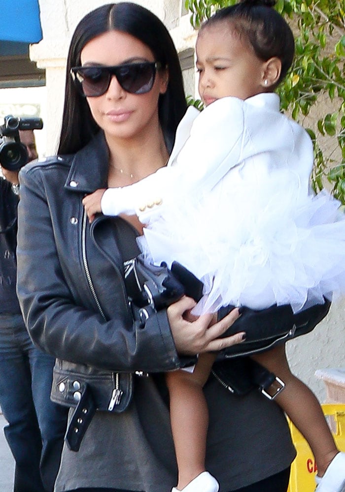 Kim Kardashian carrying style-icon in-the-making North West