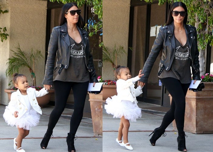 North West was dressed in a white tutu and a blazer embellished with gold buttons