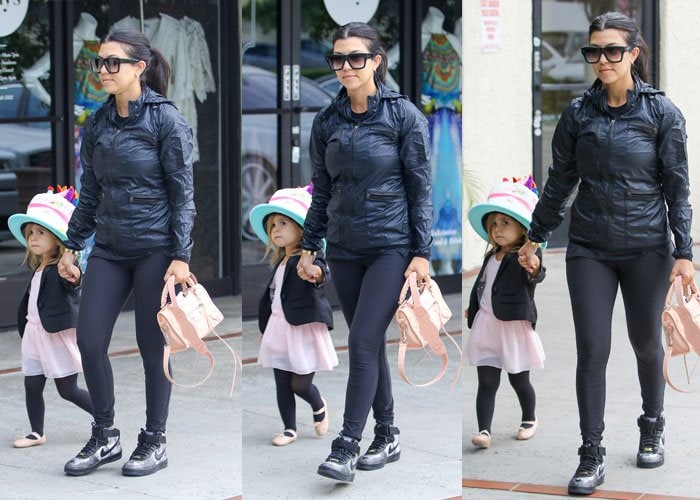 Kourtney Kardashian styled her sneakers with workout clothes