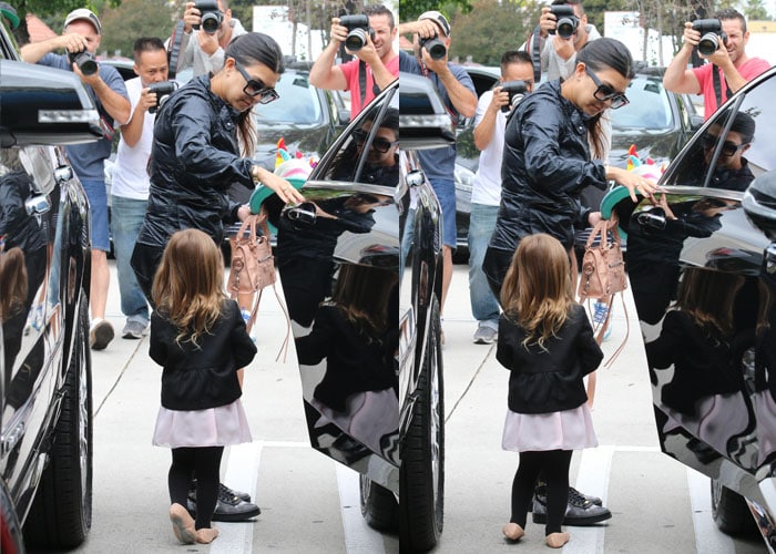 Kourtney Kardashian and her daughter were surrounded by photographers