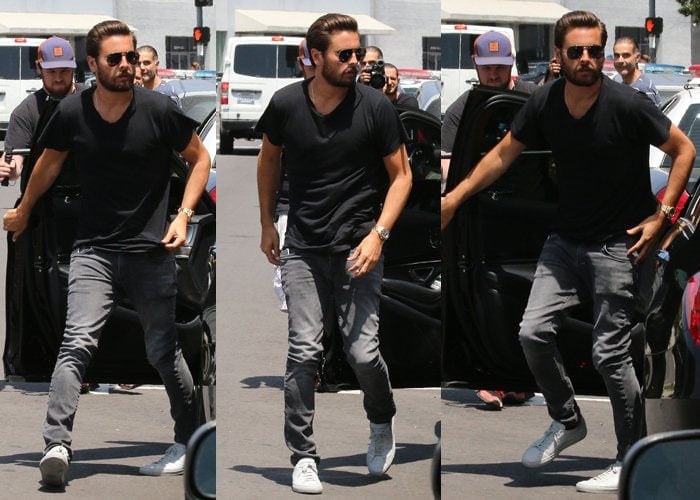 Scott Disick gets out of his car