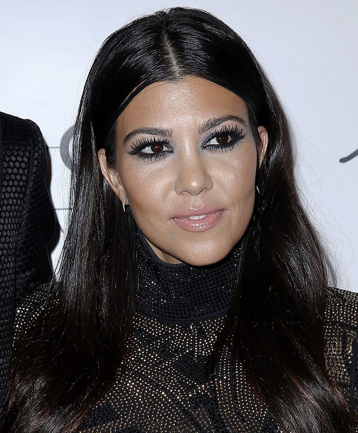 Kourtney Kardashian wears a stud-embellished Balmain dress