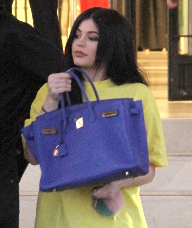 Kylie Jenner shows off her big lips while shopping at Barneys New York