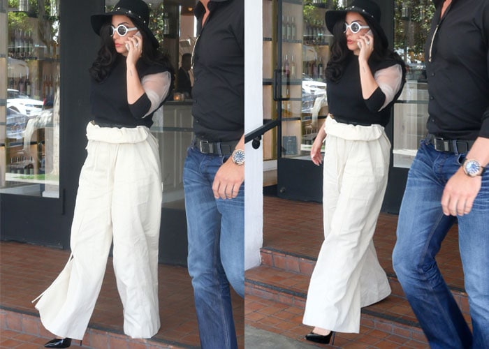 Lady Gaga wearing flared trousers that were rolled up at the waist