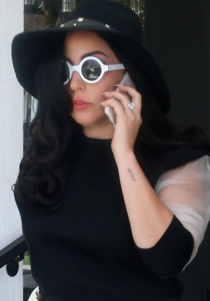 Lady Gaga shows off her huge engagement ring at Fig & Olive restaurant in Beverly Hills on May 1, 2015