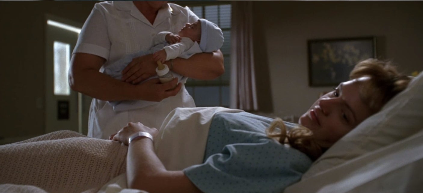 Peggy Olson refuses to look at the baby and later gives the child up for adoption