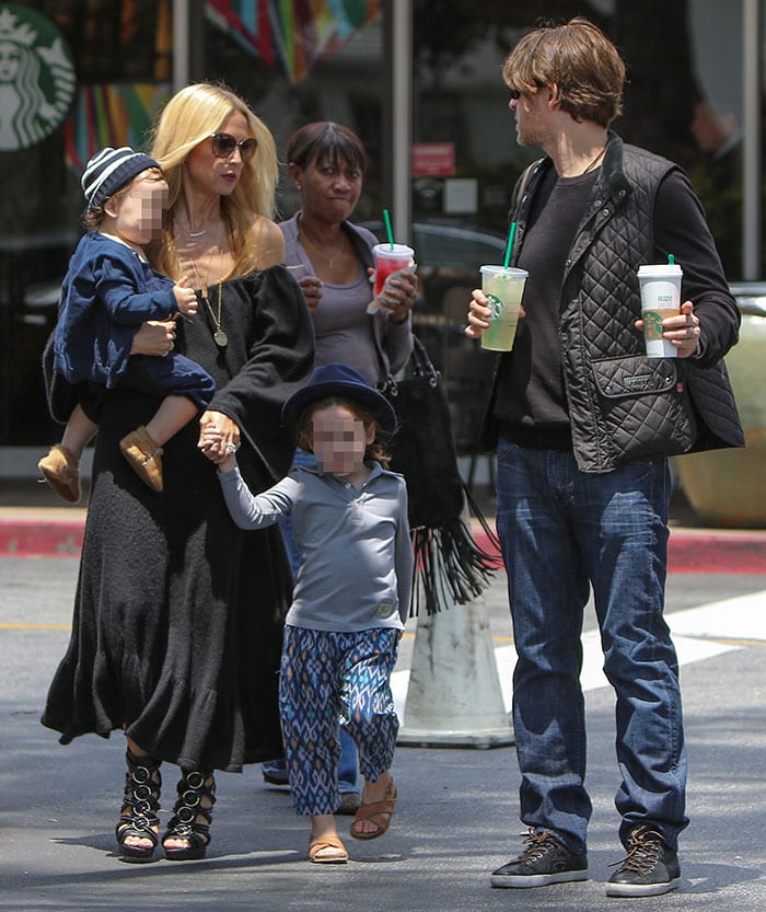 Rachel Zoe leaving a Starbucks store with her husband, Rodger Berman, and their children, Skyler and Kaius