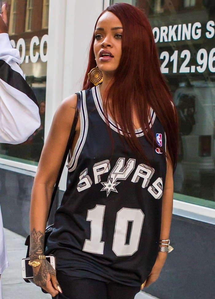 Rihanna wears a San Antonio Spurs jersey while out shopping